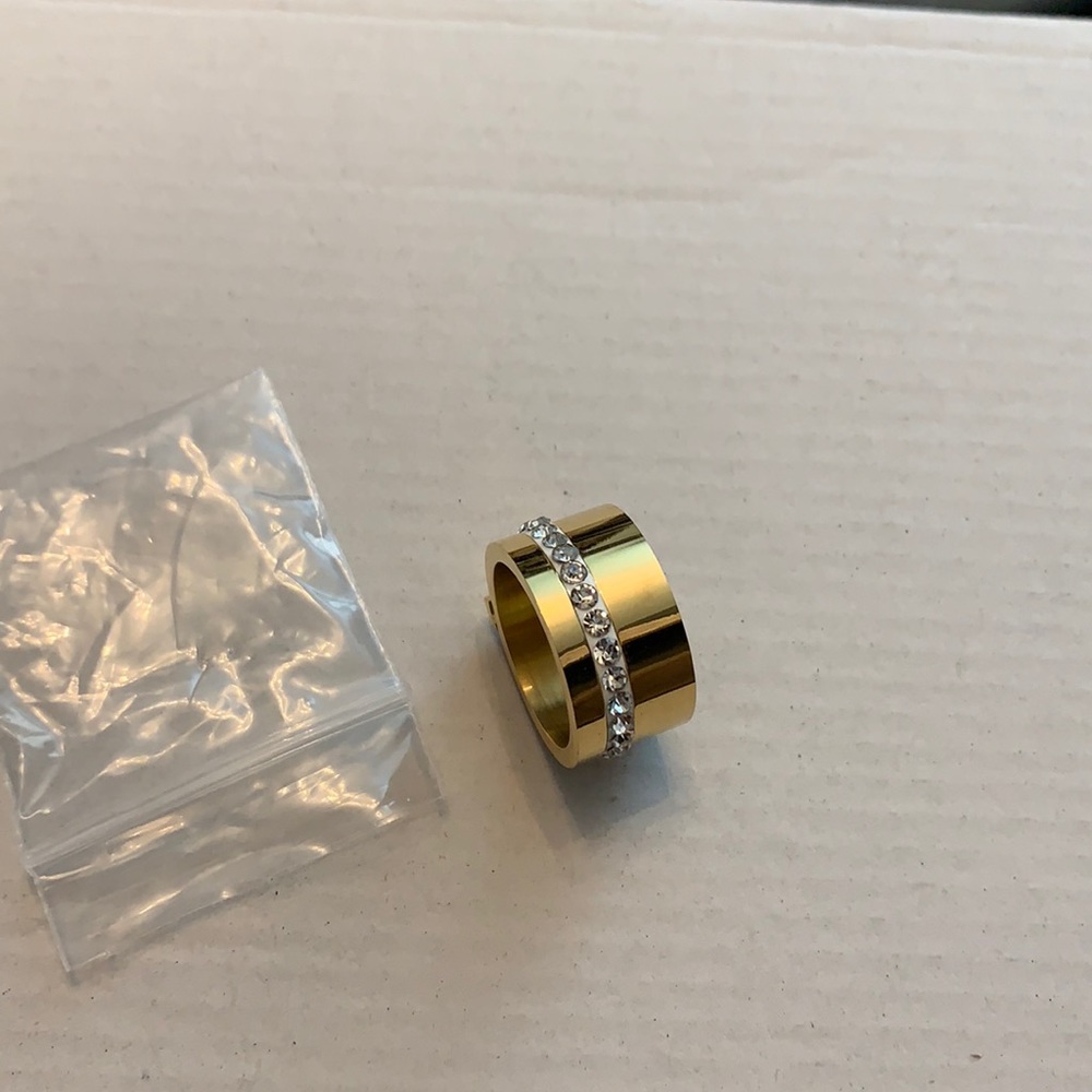 Cigar band ring with diamonds